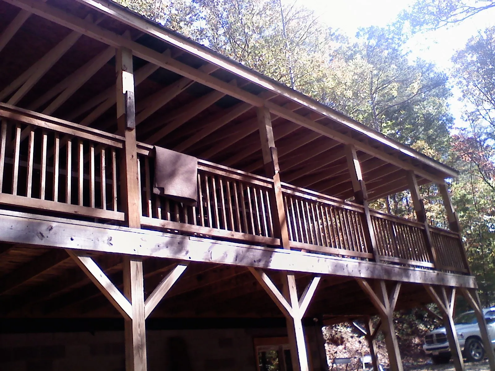 Timber framing under a new elevated porch and deck — Roof Leak Repair in Catharpin by Roofing Brothers